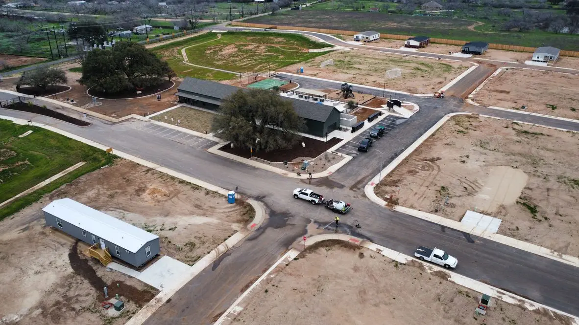 Aerial view of developing neighborhood with roads.