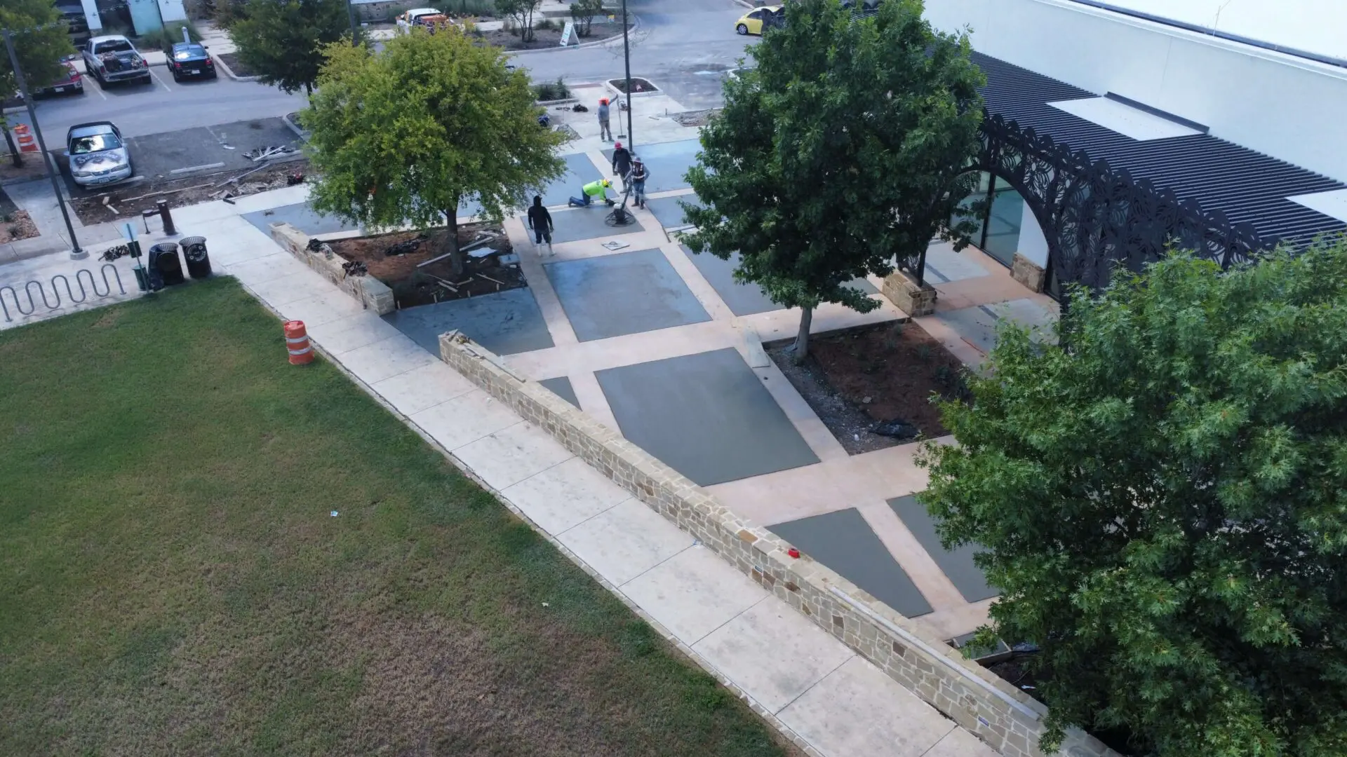 Aerial view of people walking on pavement.