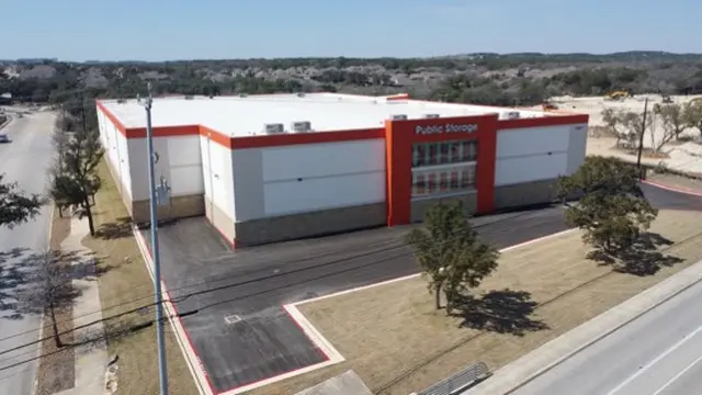 Storage building with red and white exterior.